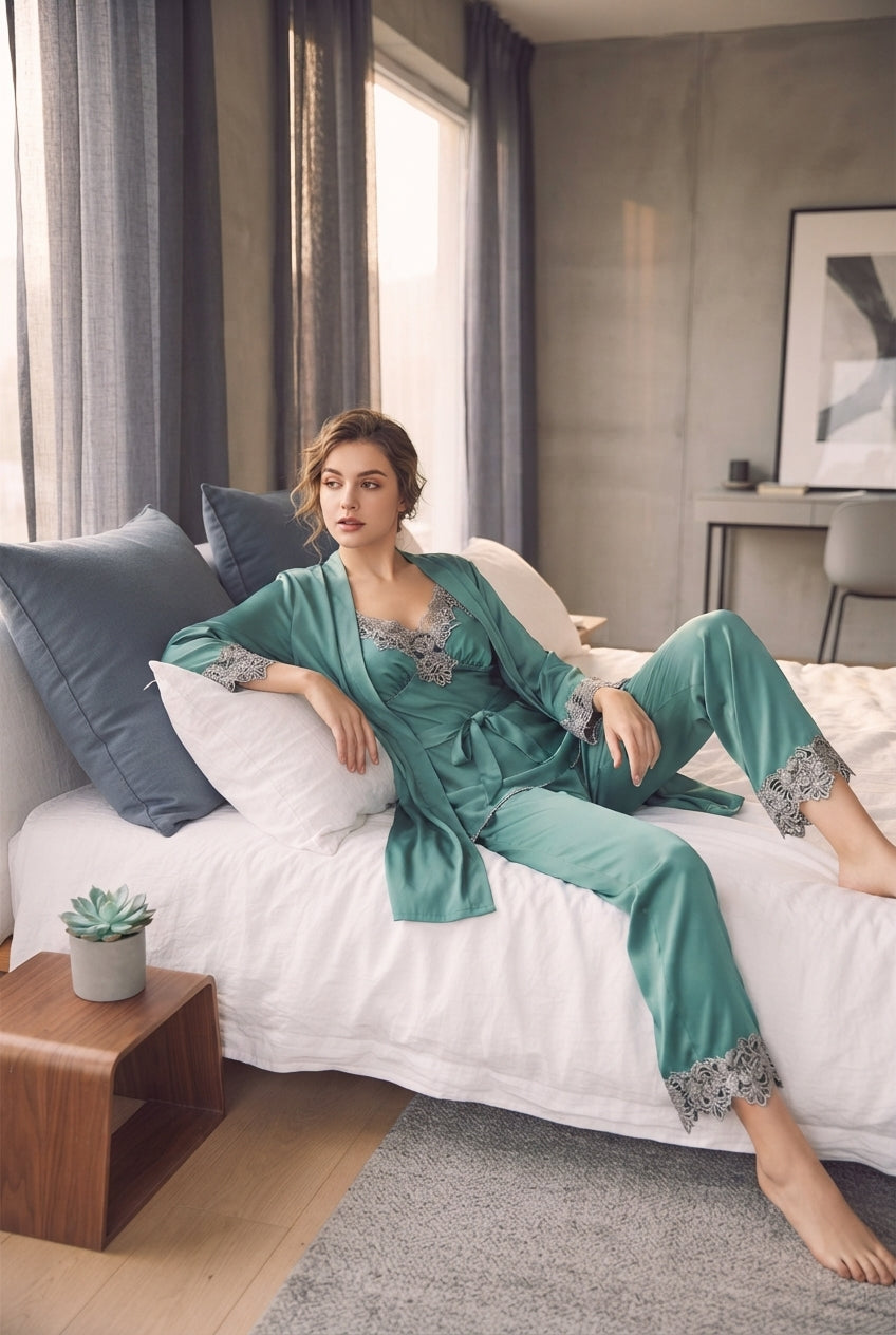 A woman relaxing in a modern bedroom wearing a luxurious ice silk five-piece pajama set in a sophisticated home setting.